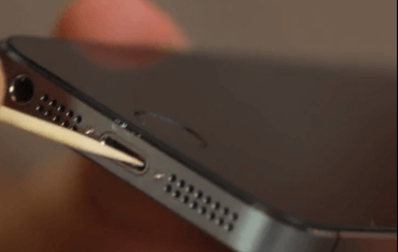 Use a toothpick or a Sim Pin to clearn dirt from charging port